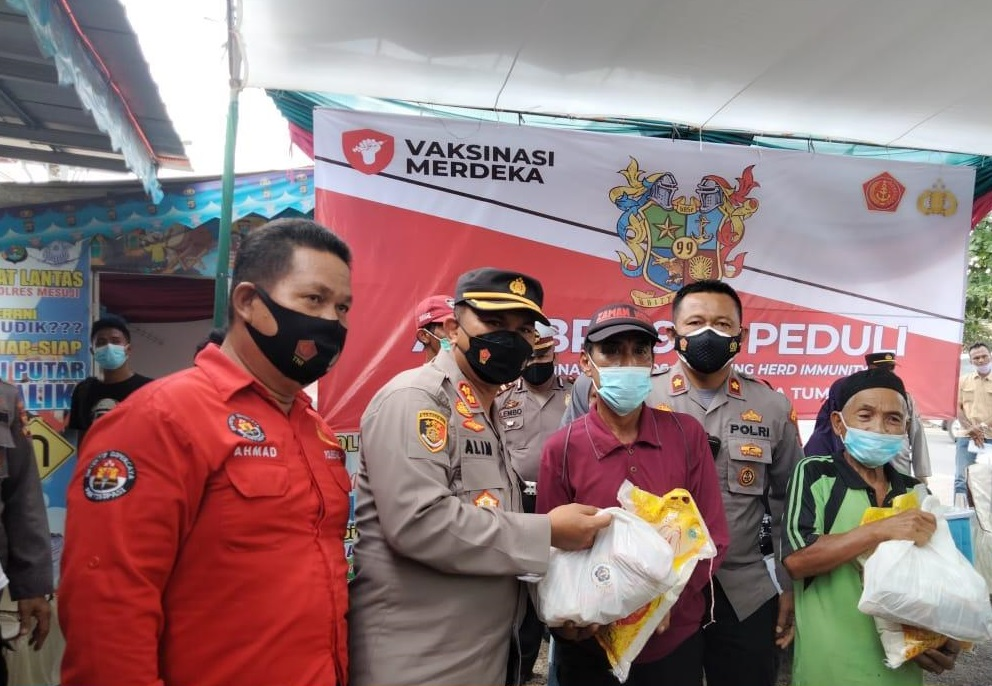 Polres Mesuji gelar kegiatan Vaksinasi Massal di gerai Vaksinasi di Kantor Mapolsek Simpang Pematang