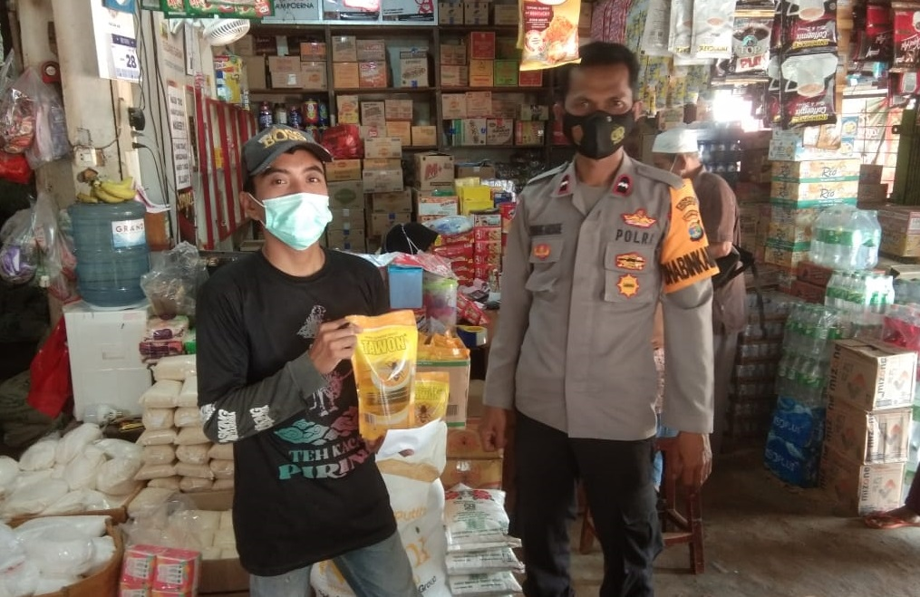  Polres Tulang Bawang Barat Sidak Stok dan Harga Minyak Goreng di Pasar-pasar