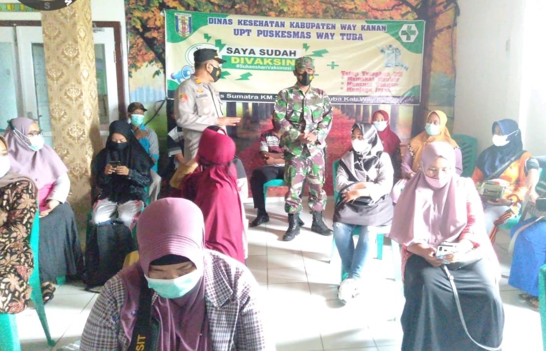 Vaksinasi Massal Covid-19, Kapolsek Ajak Masyarakat Patuhi Prokes