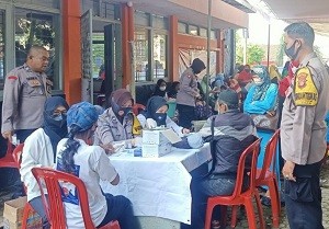 Pencairan BLT Migor di Polsek Kedaton dan Vaksin Booster   